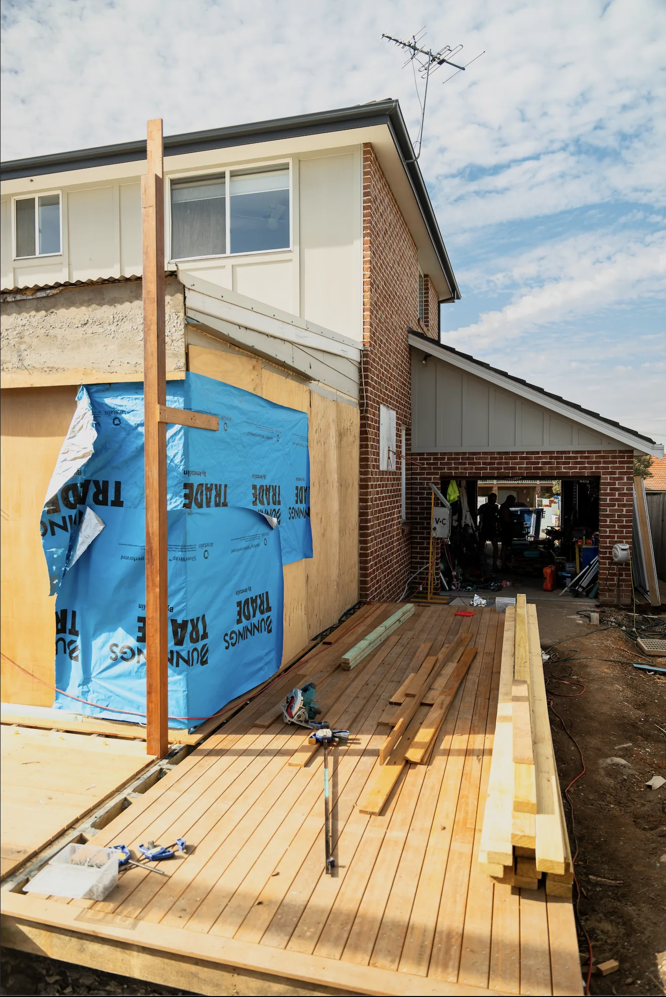 Hardwood decking part laid over the new deck frame at the rear of the Russell Lea home