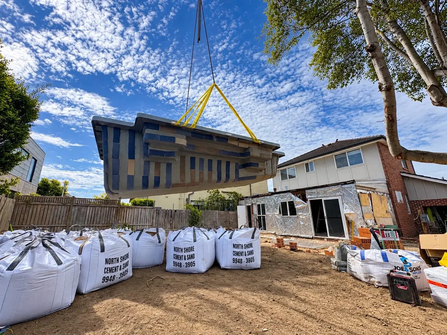 Swimming pool being craned into position during the Russell Lea renovation